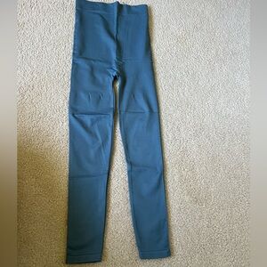 Blanqi, women’s size medium postpartum leggings in blue.